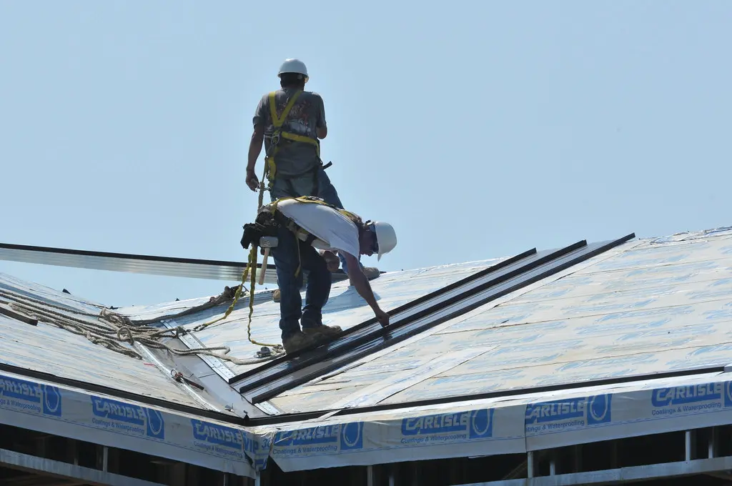 Crew working on a rooftop installation