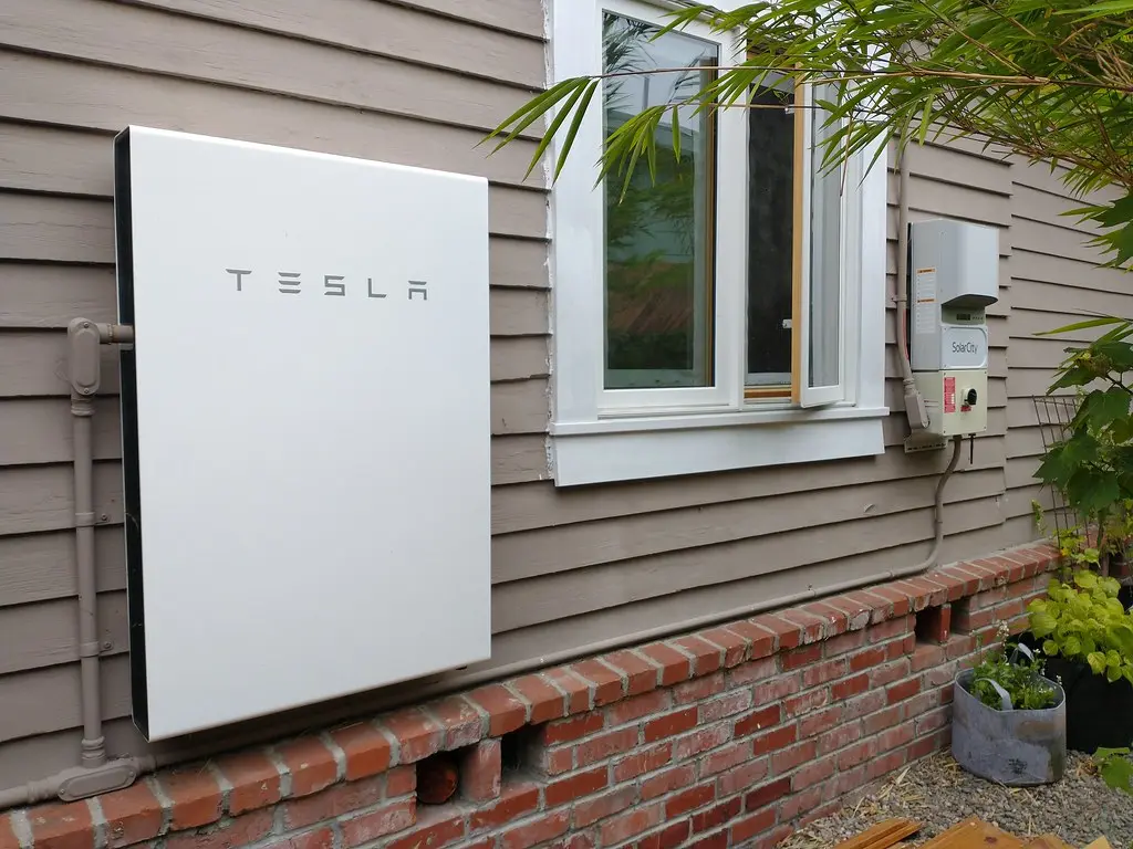 Tesla Powerwall battery in a garage
